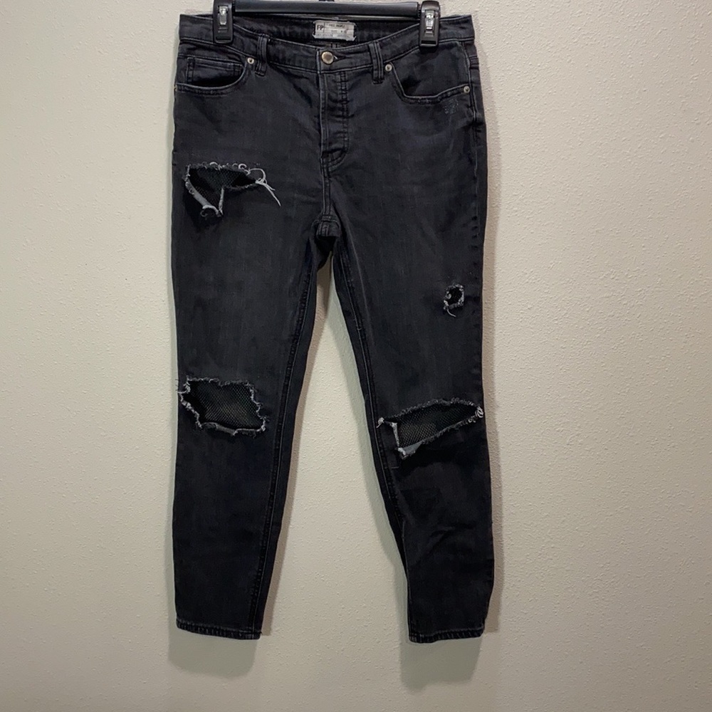 Free People jeans distressed‎ ripped with mesh inserts in the holes